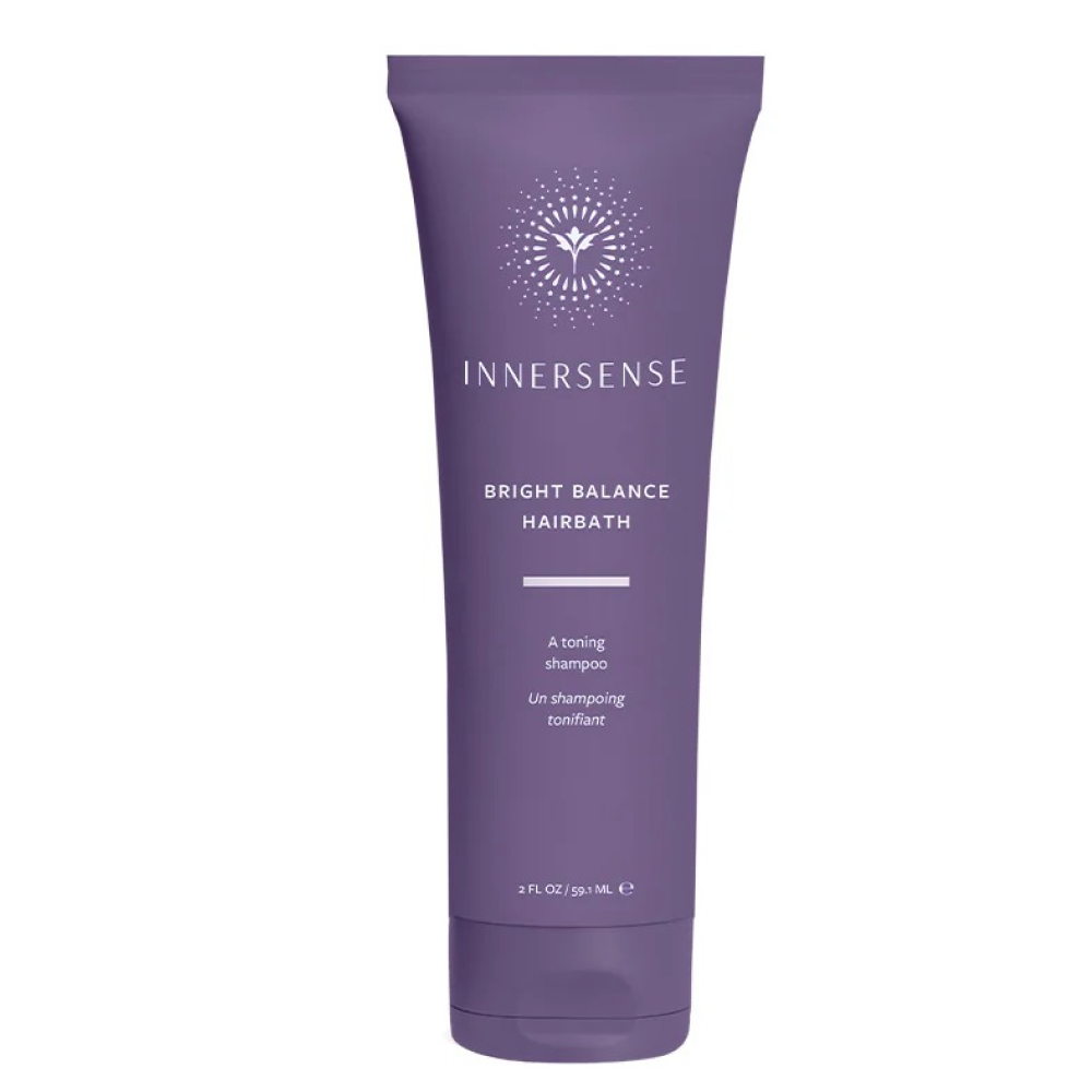 Innersense Bright Balance Hairbath: a 2 fl oz purple toning shampoo tube with white text and logo.