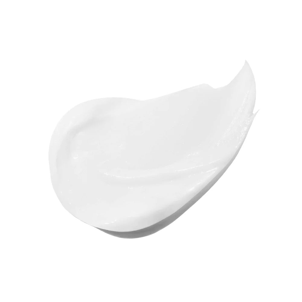 A creamy white swirl of Innersense Clarity Conditioner, showcasing its smooth, rich texture.