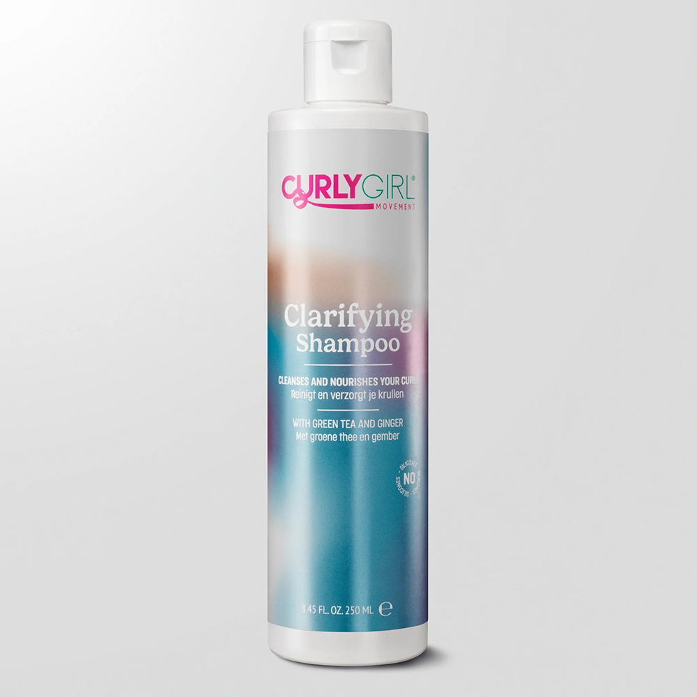 White 250ml Curly Girl Movement Clarifying Shampoo bottle with pink and blue label, green tea & ginger.
