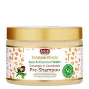 African Pride Moisture Miracle Pre-Shampoo in a clear jar with a gold lid, featuring aloe and coconut water.
