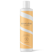 White Bouclème Curl Conditioner bottle with orange wavy stripes, 300ml, for defined, shiny hair.