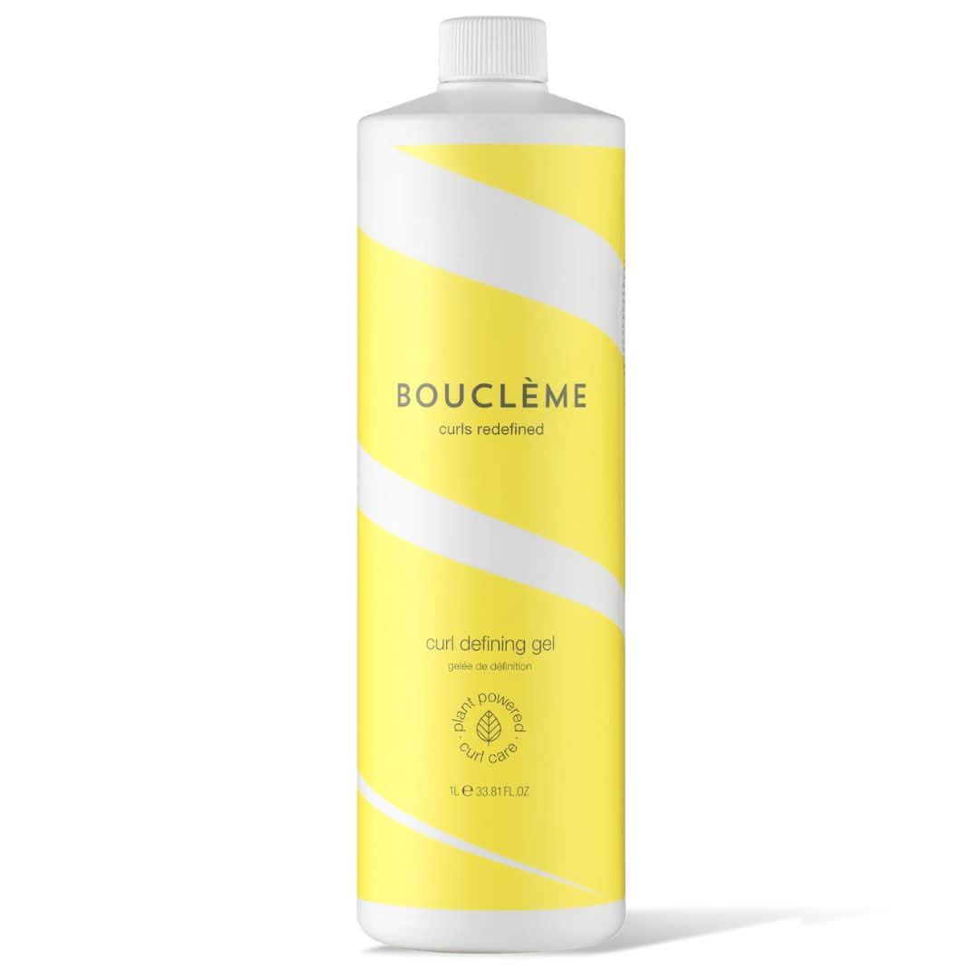 White Bouclème Curl Defining Gel bottle with yellow diagonal stripes and "plant powered curl care" logo.