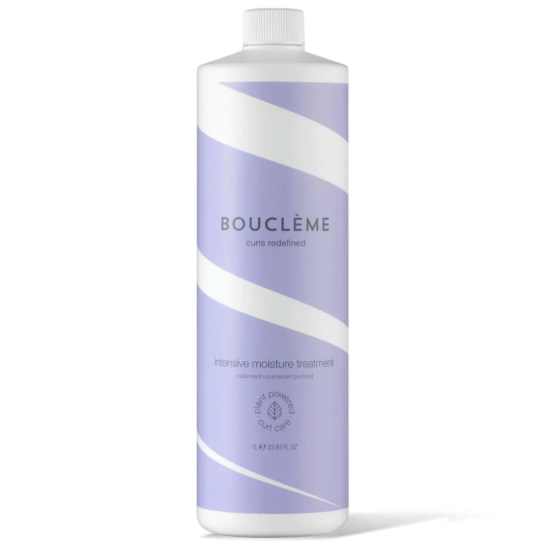 Bouclème Intensive Moisture Treatment 1L bottle, white with a lavender label and text.