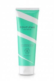 Bouclème Scalp Exfoliating Shampoo 250ml tube with white and teal diagonal stripes.