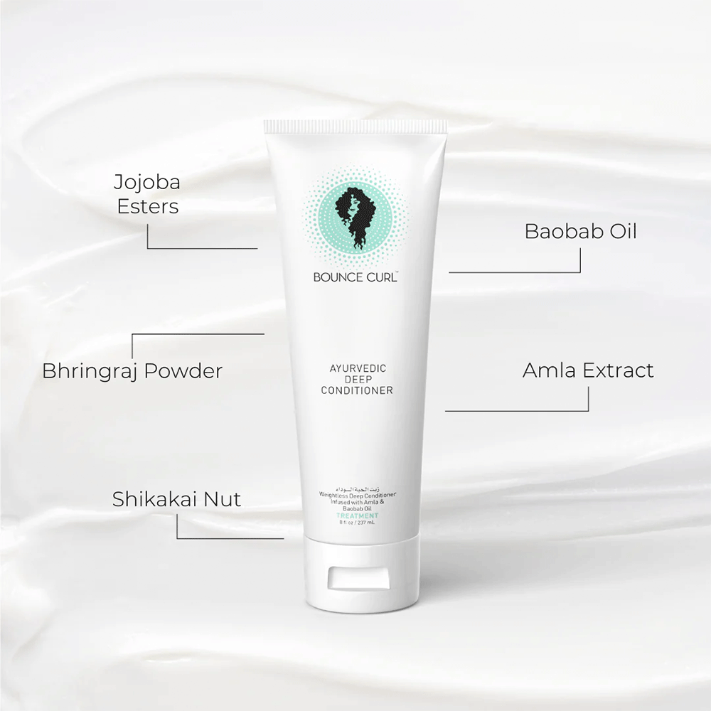 White Bounce Curl Ayurvedic Deep Conditioner tube with a teal logo, highlighting key ingredients.
