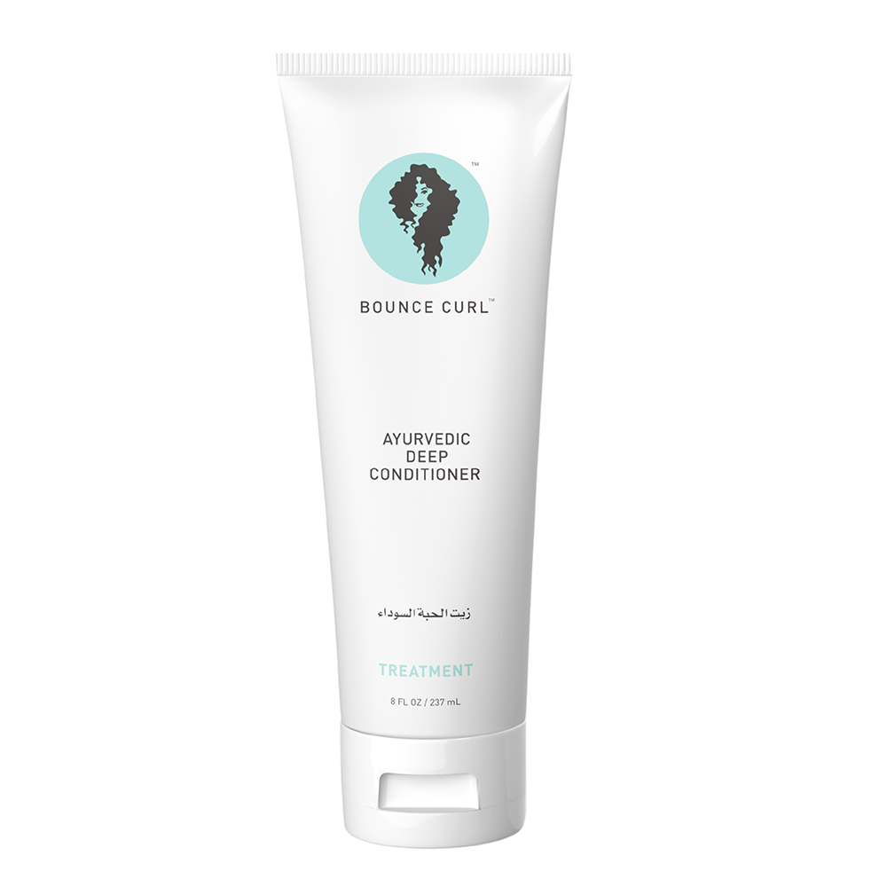 White Bounce Curl Ayurvedic Deep Conditioner tube with a teal logo and black text, 8 fl oz.