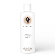 White Bounce Curl Pure Silk Moisturizing Shampoo bottle with a flip-top cap and curly hair logo.