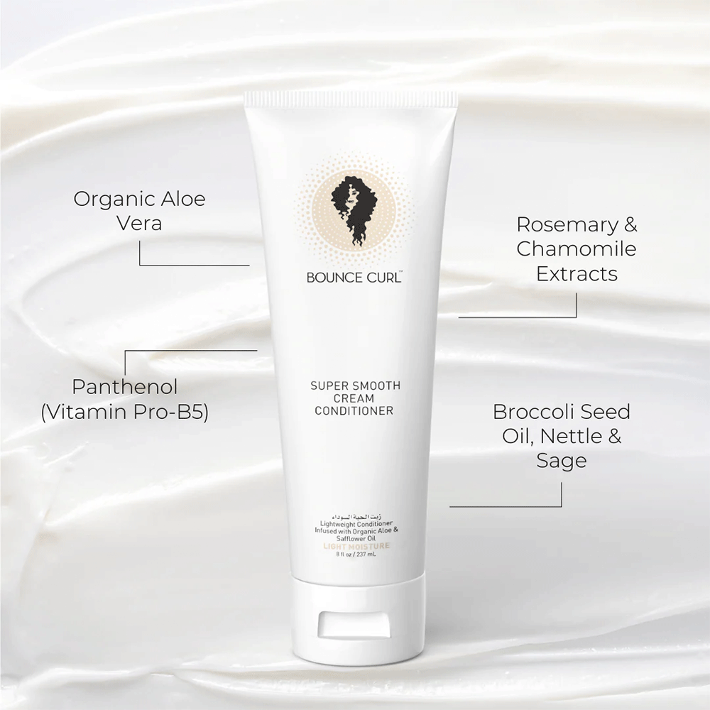 White Bounce Curl Super Smooth Cream Conditioner tube, 238ml, with key ingredients highlighted on a creamy background.