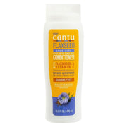 Cantu Flaxseed Smoothing Leave-In or Rinse-Out Conditioner, 400ml white bottle with yellow and purple label.