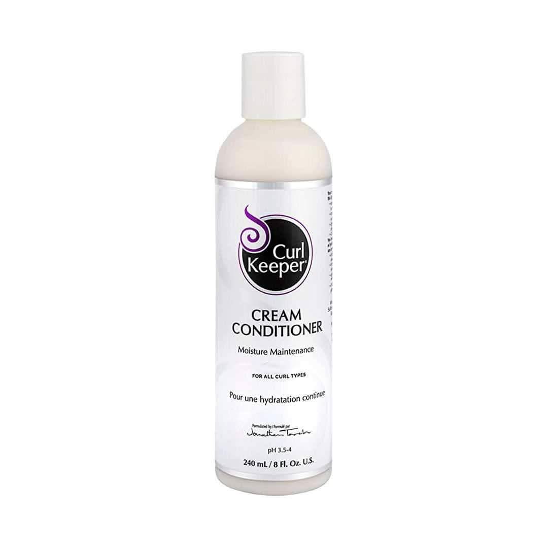 White Curl Keeper Cream Conditioner bottle with purple logo and text.