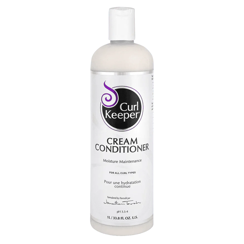 White Curl Keeper Cream Conditioner bottle with purple and black label, 1L size.