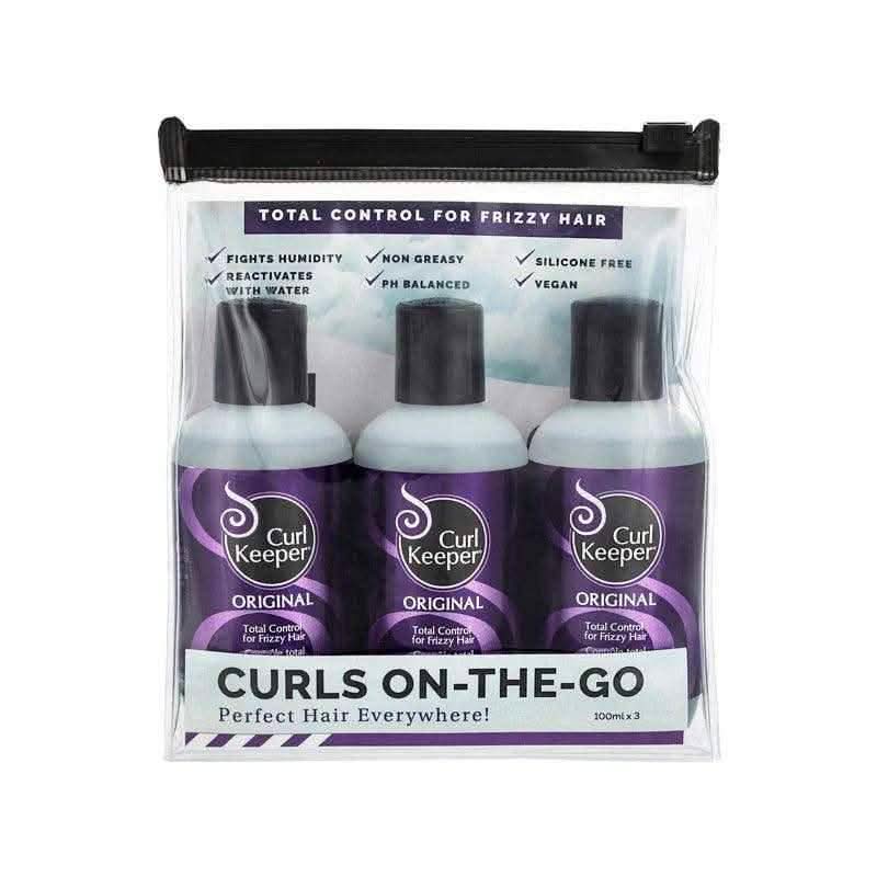 Three purple Curl Keeper Original 100ml bottles in a clear zippered travel pouch with product benefits listed.