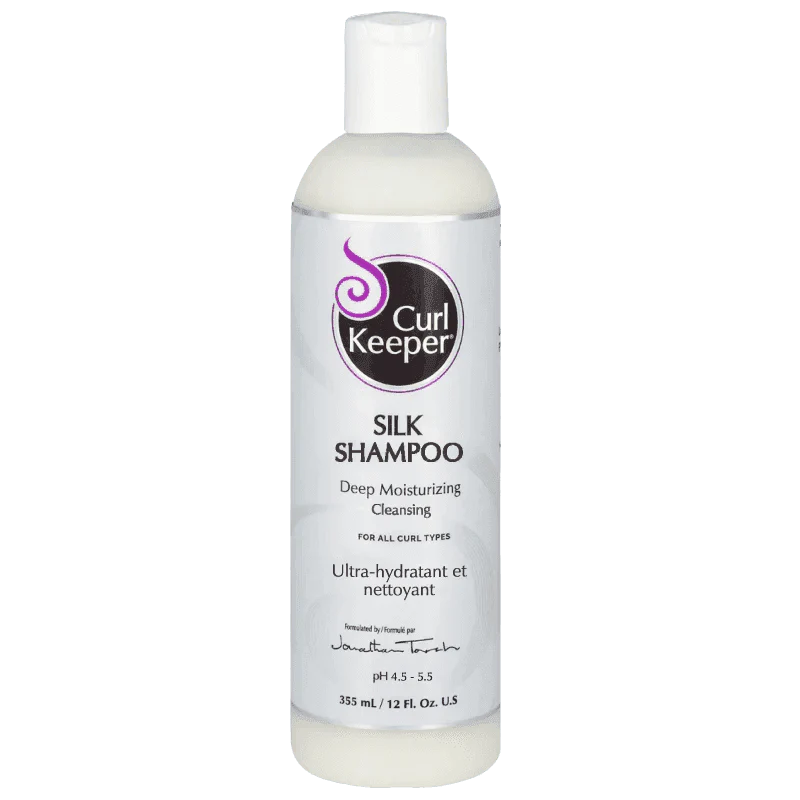 Curl Keeper Silk Shampoo in a white 355ml bottle with a purple and black label.