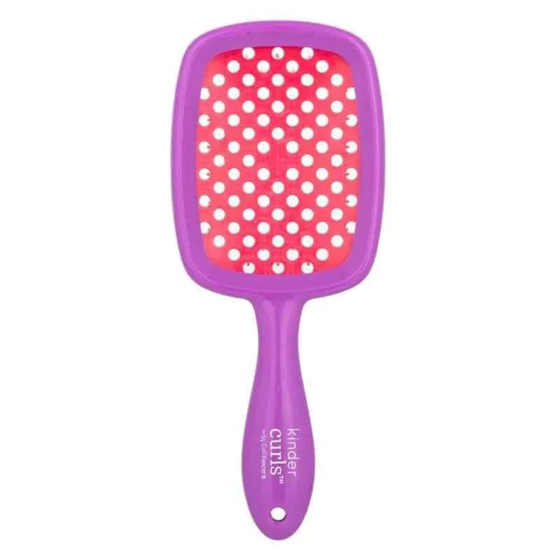 Purple Curl Keeper Kinder Brush with a pink head and white polka dot bristles.