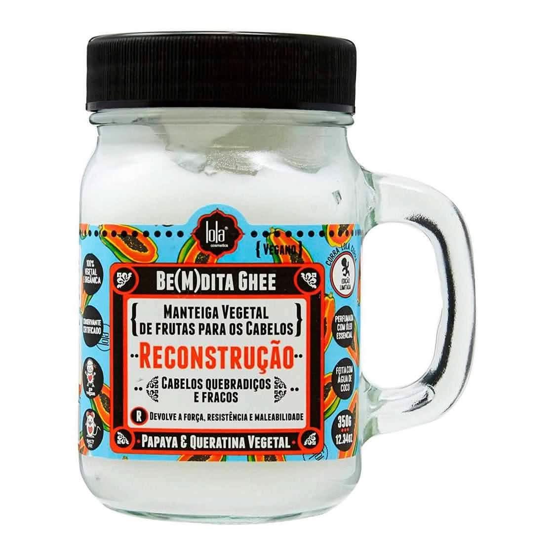 Lola Cosmetics Be(M)dita Ghee Reconstruction Mask in a clear glass jar with a black lid and handle.