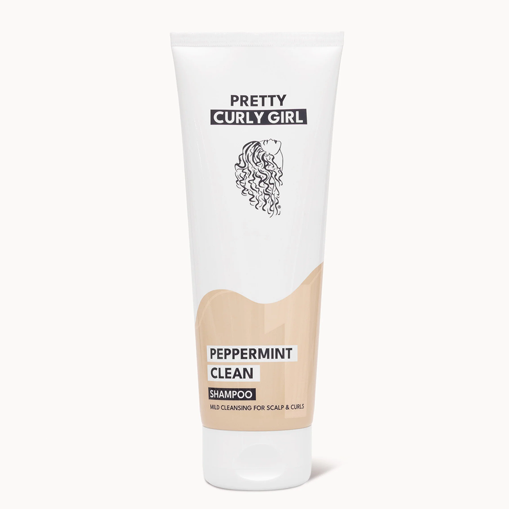 Pretty Curly Girl Peppermint Clean Shampoo in a white and beige tube with a curly hair logo.
