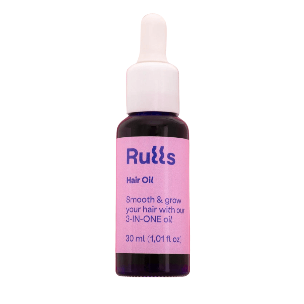 Rulls 3-In-One Hair Oil in a small dark glass dropper bottle with a pink label, 30 ml.