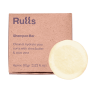 Rulls Solid Shampoo Bar, 80g, with kraft paper packaging and a light yellow, round bar.