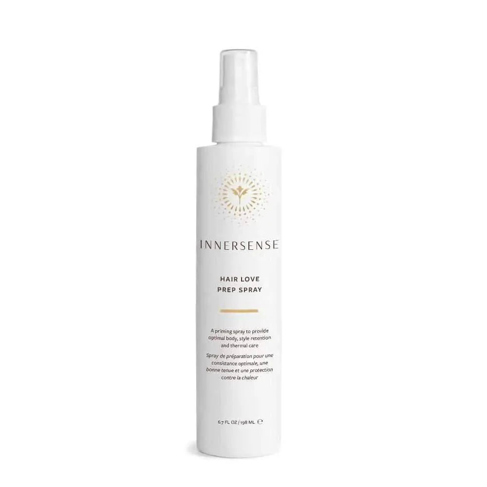 White Innersense Hair Love Prep Spray bottle with gold sunburst logo, 6.7 fl oz.