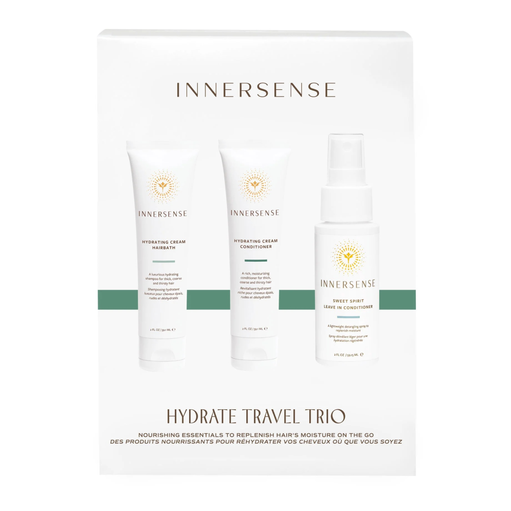 Innersense Hydrate Travel Trio: three white bottles (shampoo, conditioner, leave-in) with gold sun logo on white card.